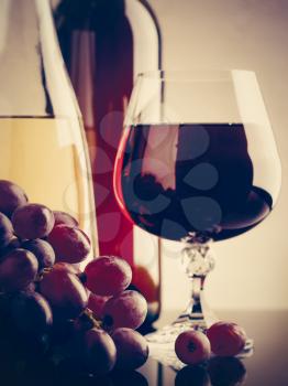 Wine and grape. Winery still life on the glass with reflections