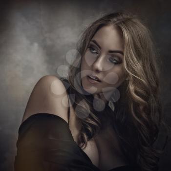 Vamp style blonde, Dramatic female portrait with faded colours