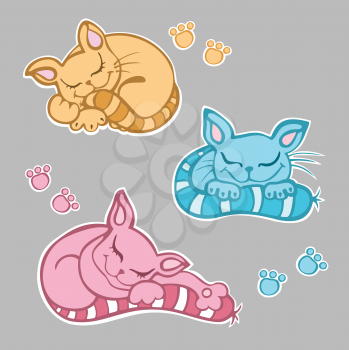 Royalty Free Clipart Image of Kittens Sleeping