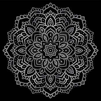 Silver mandala on black background. Indian pattern.