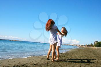 Royalty Free Photo of Two Women on the Beach
