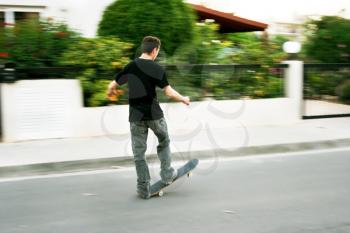 Royalty Free Photo of a Boy on a Skateboard