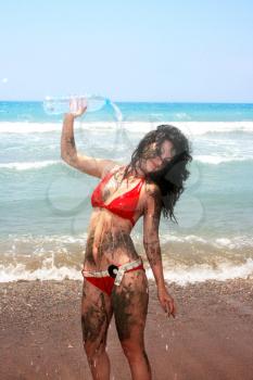 Royalty Free Photo of a Girl on the Beach