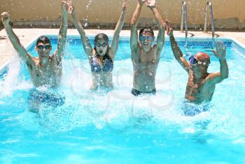 Royalty Free Photo of People Having Fun in a Swimming Pool