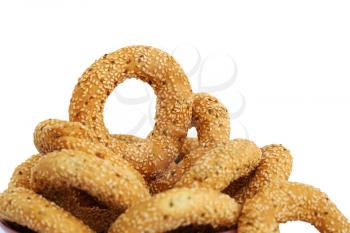 Round rusks with sesame seeads isolated on white background.