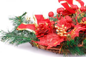Christmas decoration with red cone, leaves, ribbon  and fir-tree branch.