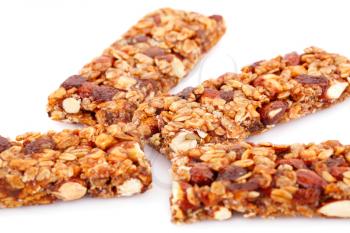 Cereal bars with different nuts isolated on white background.