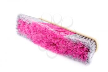 Colorful broom isolated on white background.