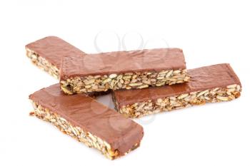 Muesli bars with different nuts and seeds isolated on white background.