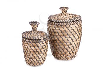 Two wicker boxes isolated on white background.