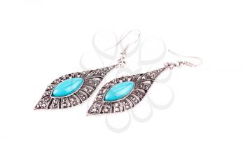 Ancient style earrings isolated on white background.