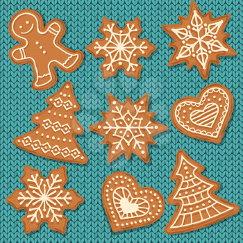 Cute gingerbread elements isolated on knitted  background. Christmas gingerbread background. Vector