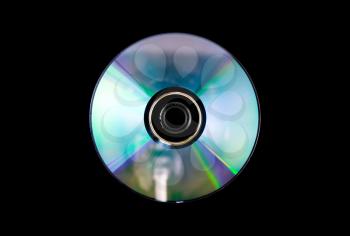 Single DVD-RW disc on black background.