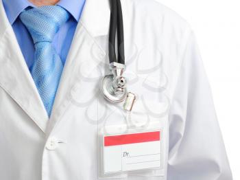 Fragment medical doctor's smock with stethoscope. Isolated over white