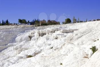 Limy cascades of flowing down water in Turkey. Pamukkale