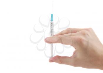 Syringe in a hand , ready for injection with medication. white background