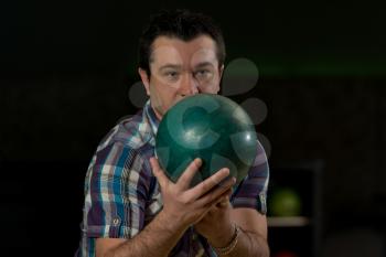 Bowler Poised With His Ball