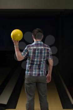 Bowler Poised With His Ball