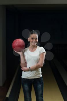 Young Women Bowling