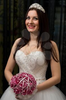 Bride Holding Her Wedding Flowers