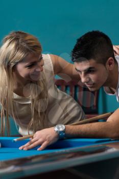 Couple Playing Billiard