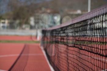 Tennis Court Net and Court Beyond