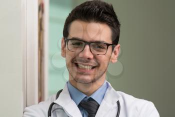 Portrait Of Smiling Young Male Doctor