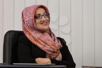 Happy Muslim Businesswoman In The Office