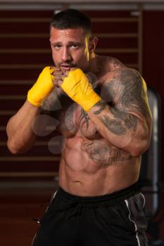 Muscular Boxer MMA Fighter Practice His Skills