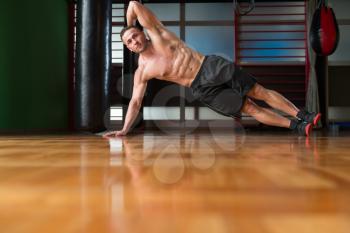 Exercising Abs Side Plank Hip Raise Abdominal Crunch In Fitness Club