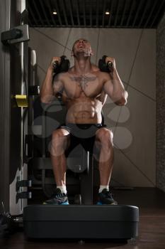 Man Using A Press Machine In A Fitness Club - Dont Skip Leg Day