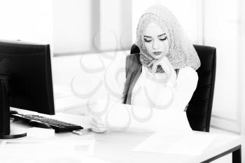 Muslim Business Woman Writing A Letter - Notes Or Correspondence Or Signing A Document Or Agreement