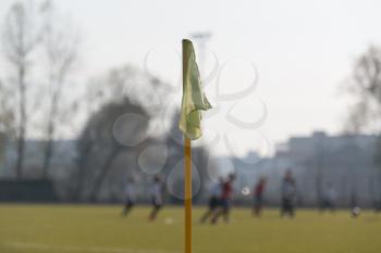 Sport and Game Concept - Close Up of Football Field Corner With Flag Marker