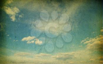 grunge image of blue sky with clouds 