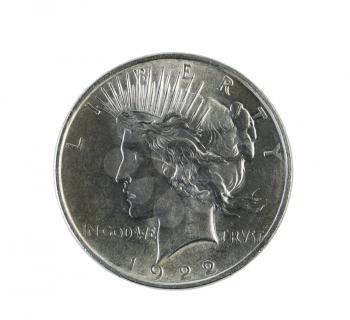 Closeup photo of a Peace Silver Dollar, obverse side, isolated on white  