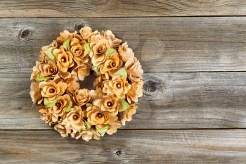 Wreath made with real natural birch wood on rustic wood. 