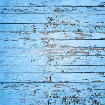 Vintage old blue wooden wall background. Closeup.