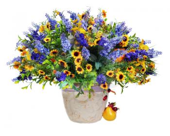 Colorful floral bouquet of lilies, sunflowers and irises flowers arrangement centerpiece in vase isolated on white background.