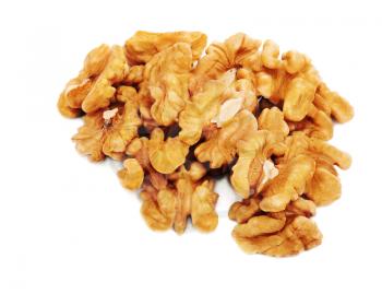 Heap of fresh shelled walnuts on white background. Close-up.