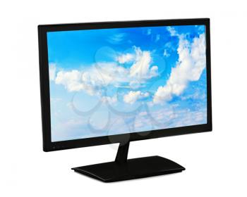Black lcd monitor with blue sky isolated on white background. Closeup.