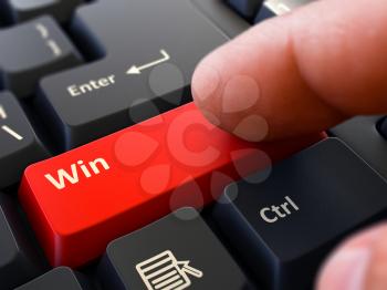 Win Button. Male Finger Clicks on Red Button on Black Keyboard. Closeup View. Blurred Background. 3D Render.