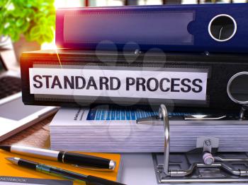 Standard Process - Black Office Folder on Background of Working Table with Stationery and Laptop. Standard Process Business Concept on Blurred Background. Standard Process Toned Image. 3D.