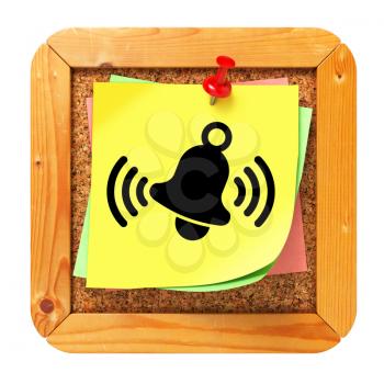 Ringing Bell Icon on Yellow Sticker on Cork Message Board.