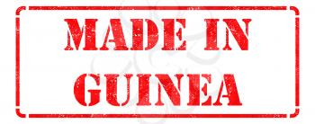 Made in Guinea inscription on Red Rubber Stamp Isolated on White.