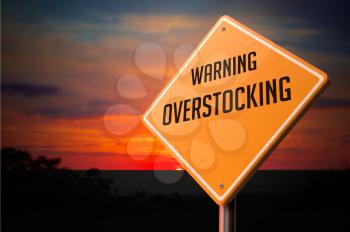 Royalty Free Clipart Image of Warning Overstocking Text on Road Sign