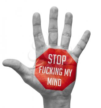 Royalty Free Photo of a Hand With STOP FUCKING MY MIND Painted on It