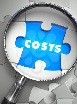 Costs - Puzzle with Missing Piece through Loupe. 3d Illustration with Selective Focus. 