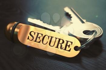 Secure - Bunch of Keys with Text on Golden Keychain. Black Wooden Background. Closeup View with Selective Focus. 3D Illustration. Toned Image.