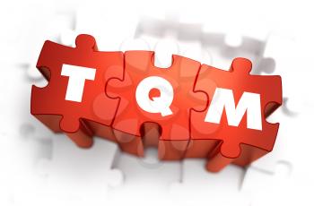 TQM - Total Quality Management - White Word on Red Puzzles on White Background. 3D Illustration.