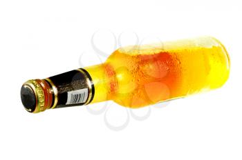 Royalty Free Photo of a Bottle of Beer on Its Side
